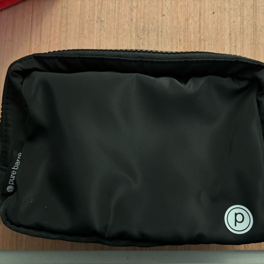 Pure Barre branded belt/crossbody bag.
